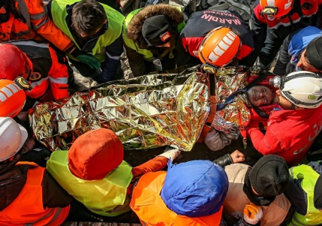 Woman rescued after being buried in rubble for 104 hours